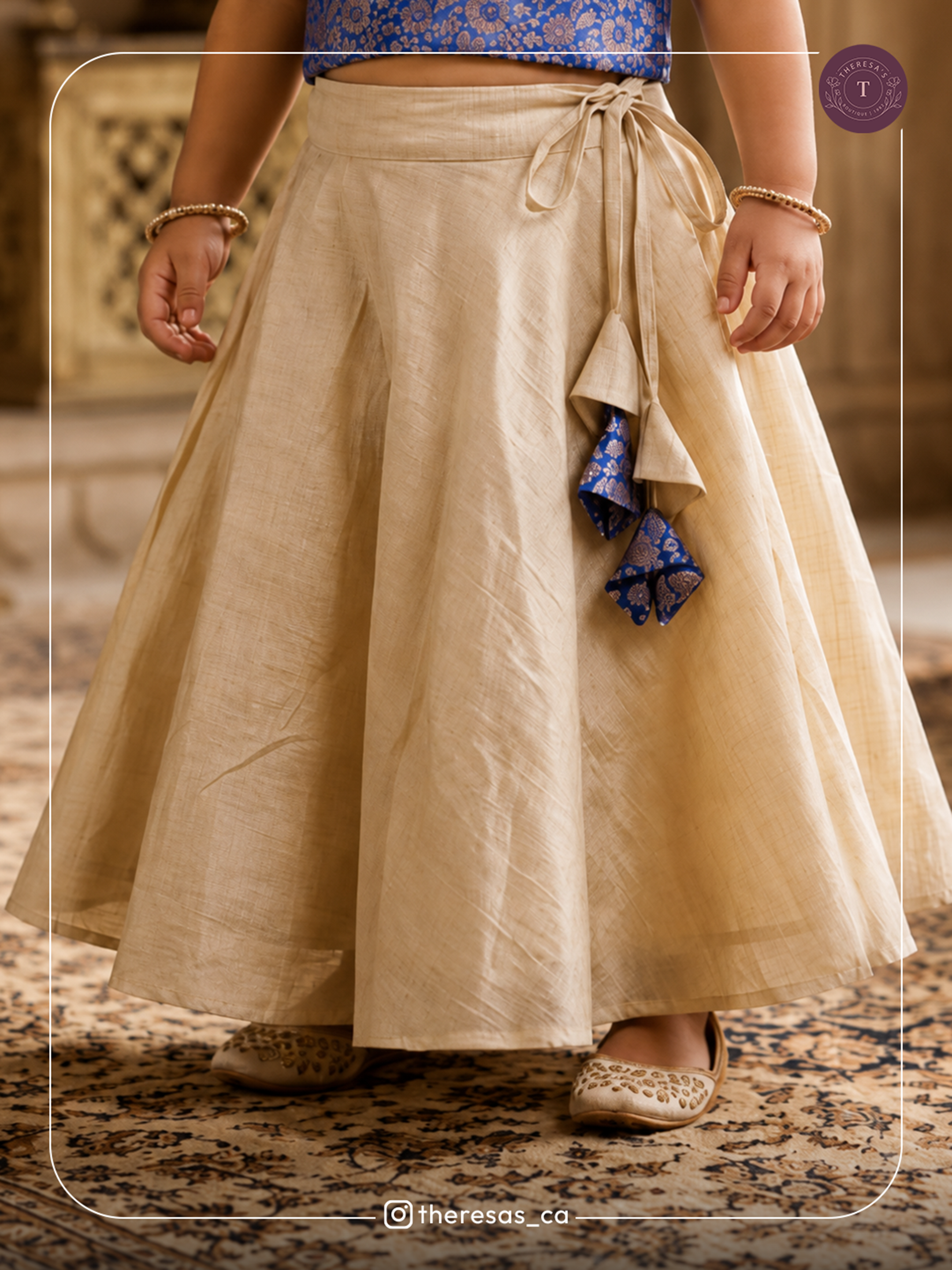 Blue Sleeveless Blouse with Cream Long Skirt